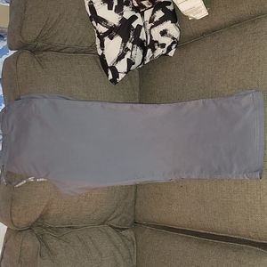 Hello I am selling my gray med couture pants size large petite.